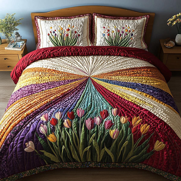 Tulip Valley quilted 3-piece bedding set on a made bed with two matching pillow shams