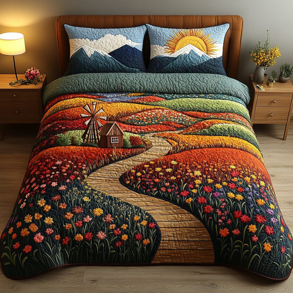 Turning Winds quilted 3-piece bedding set on a made bed with two matching pillow shams