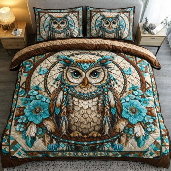 Turquoise Tribal Owl quilted 3-piece bedding set on a made bed with two matching pillow shams