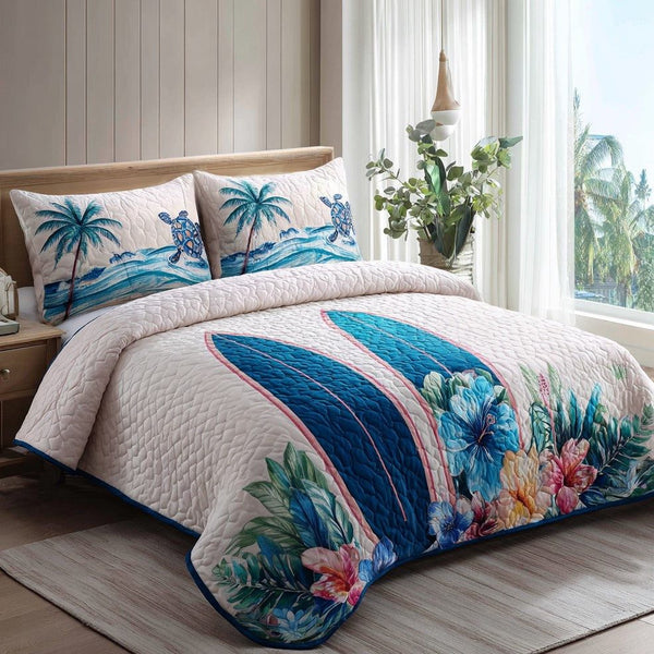 Turtle Cove quilted 3-piece bedding set on a made bed in a light coastal bedroom