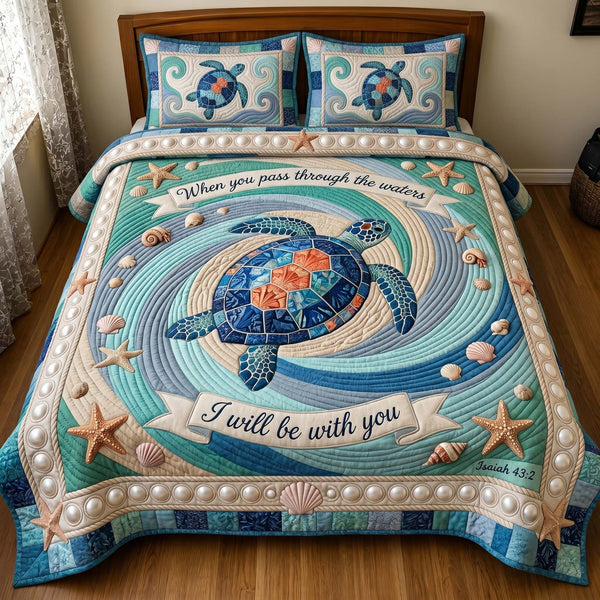 Turtle Grace quilted 3-piece bedding set on a made bed in a light coastal bedroom