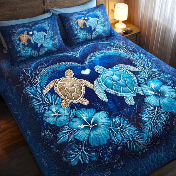Turtle Oasis quilted 3-piece bedding set on a made bed in a light coastal bedroom