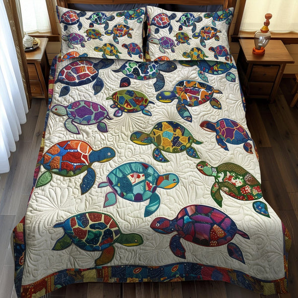 Turtle Oasis quilted 3-piece bedding set on a made bed in a light coastal bedroom