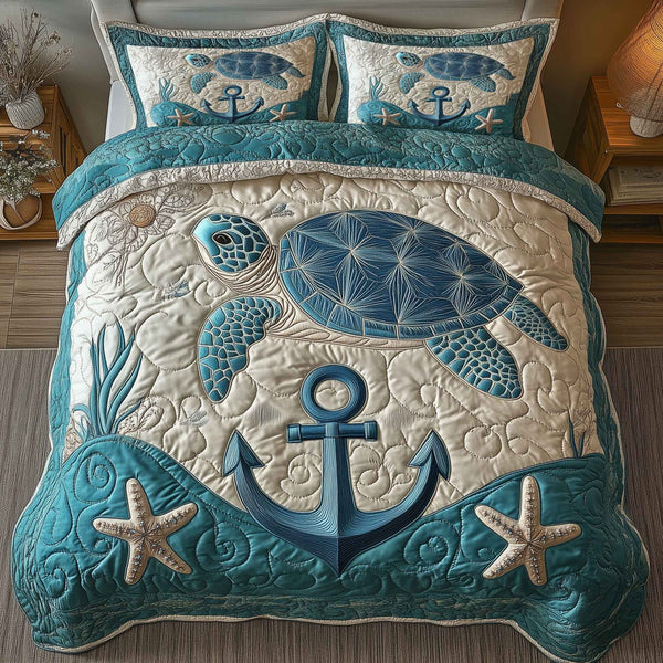 Turtle’s Haven quilted 3-piece bedding set on a made bed in a light coastal bedroom