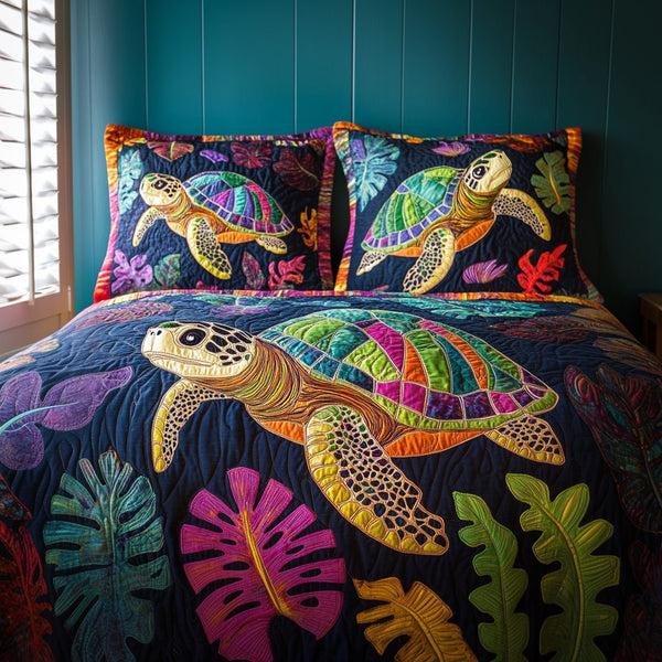 Turtle Tide quilted 3-piece bedding set on a made bed in a light coastal bedroom
