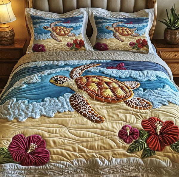Turtle Tides Retreat quilted 3-piece bedding set on a made bed in a light coastal bedroom