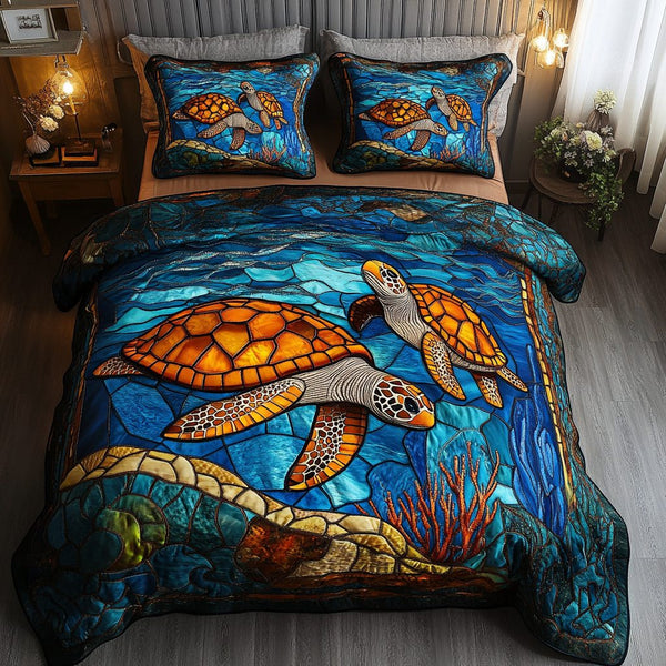 Turtle Tracks quilted 3-piece bedding set on a made bed in a light coastal bedroom
