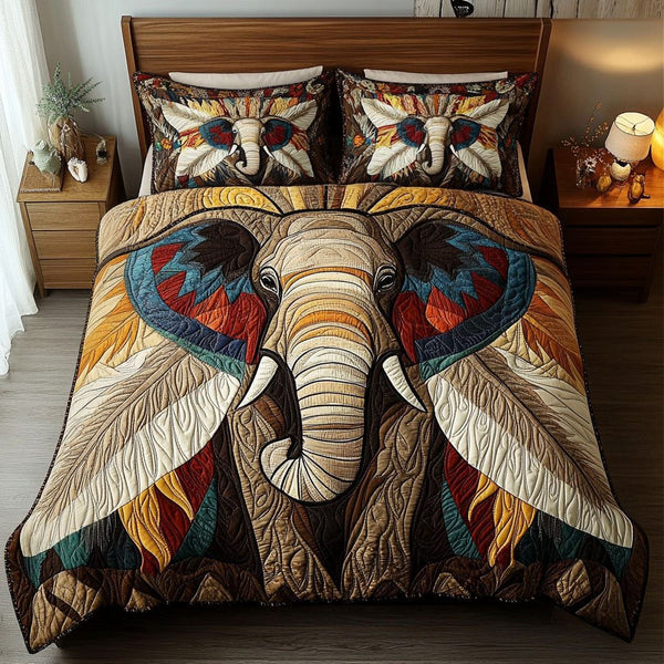 Tusk of the Wind quilted 3-piece bedding set on a made bed with two matching pillow shams