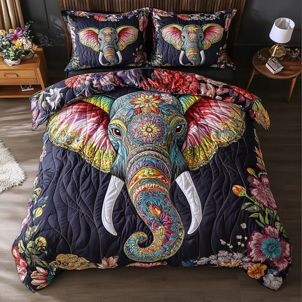 Tusker Tales quilted 3-piece bedding set on a made bed with two matching pillow shams