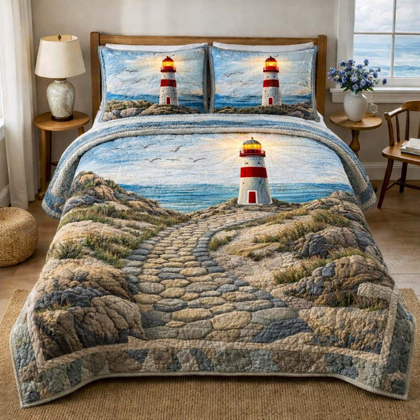Twilight Beacon quilted 3-piece bedding set on a made bed with two matching pillow shams