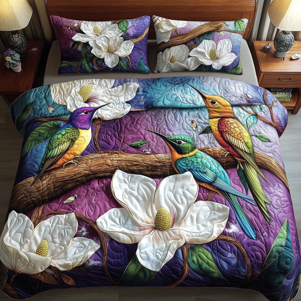 Twilight Blossom Song quilted 3-piece bedding set on a made bed with two matching pillow shams