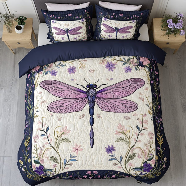 Twilight Dancer quilted 3-piece bedding set on a made bed with two matching pillow shams
