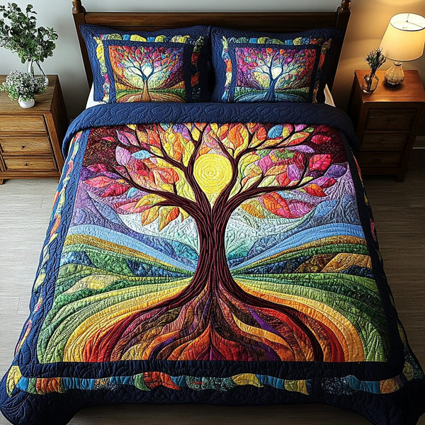 Twilight Dreams quilted 3-piece bedding set on a made bed with two matching pillow shams