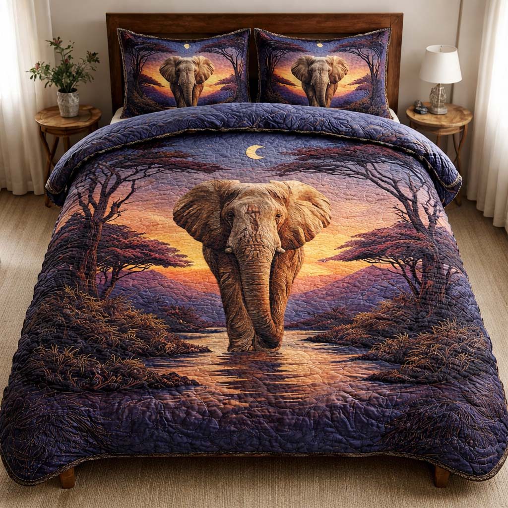 Twilight Elephant quilted 3-piece bedding set on a made bed with two matching pillow shams