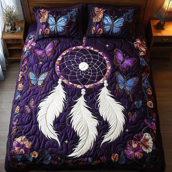 Twilight Flight quilted 3-piece bedding set on a made bed with two matching pillow shams