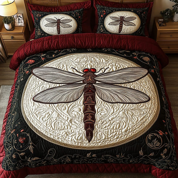Twilight Flutter quilted 3-piece bedding set on a made bed with two matching pillow shams