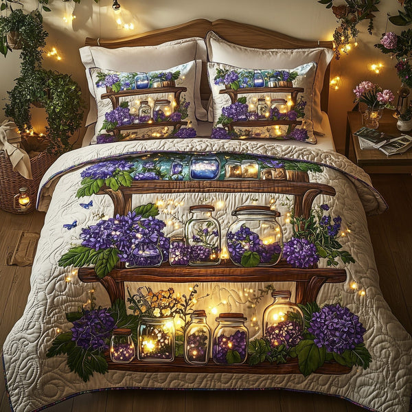 Twilight Garden quilted 3-piece bedding set on a made bed with two matching pillow shams