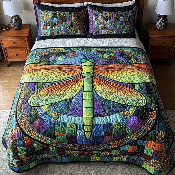 Twilight Glider quilted 3-piece bedding set on a made bed with two matching pillow shams