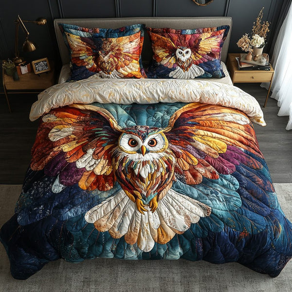 Twilight Guardian quilted 3-piece bedding set on a made bed with two matching pillow shams