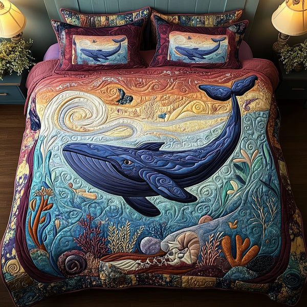 Twilight Ocean Whales quilted 3-piece bedding set on a made bed in a light coastal bedroom
