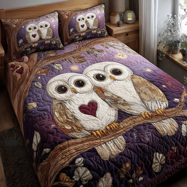 Twilight Owls quilted 3-piece bedding set on a made bed with two matching pillow shams