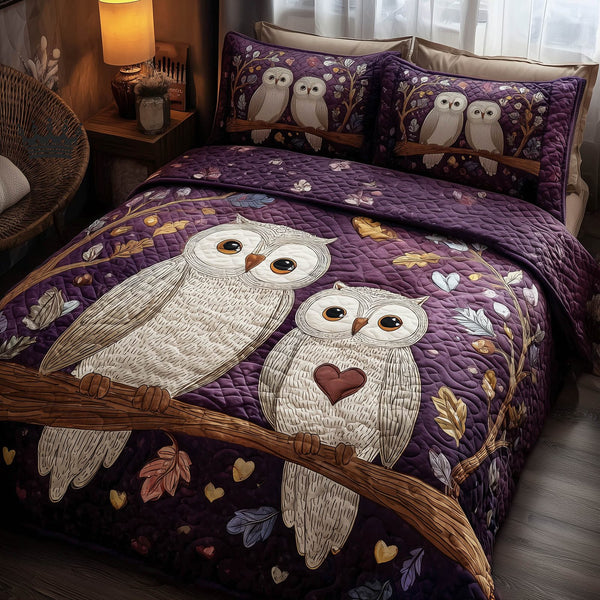 Twilight Owls quilted 3-piece bedding set on a made bed with two matching pillow shams