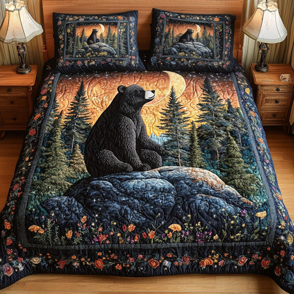 Twilight Sentinel quilted 3-piece bedding set on a made bed with two matching pillow shams