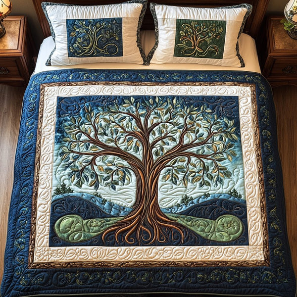 Twilight Tree Haven quilted 3-piece bedding set on a made bed with two matching pillow shams