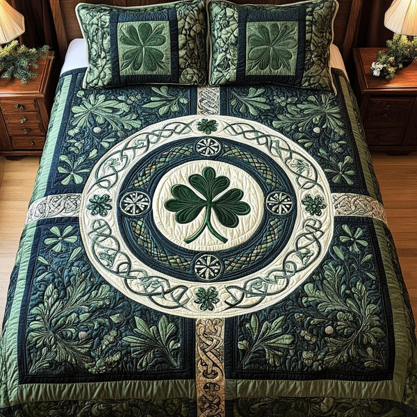 Twilight Tree Haven quilted 3-piece bedding set on a made bed with two matching pillow shams