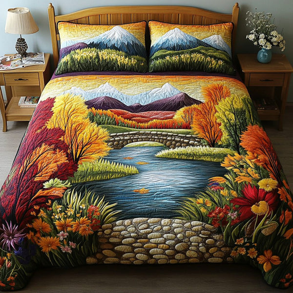 Twilight Waters quilted 3-piece bedding set on a made bed with two matching pillow shams