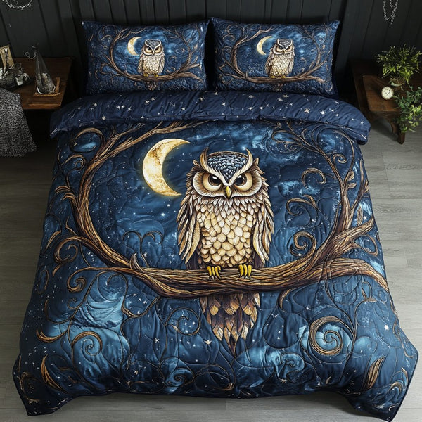 Twilight Wings quilted 3-piece bedding set on a made bed with two matching pillow shams