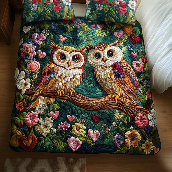 Twinkling Eyes of Love quilted 3-piece bedding set on a made bed with two matching pillow shams