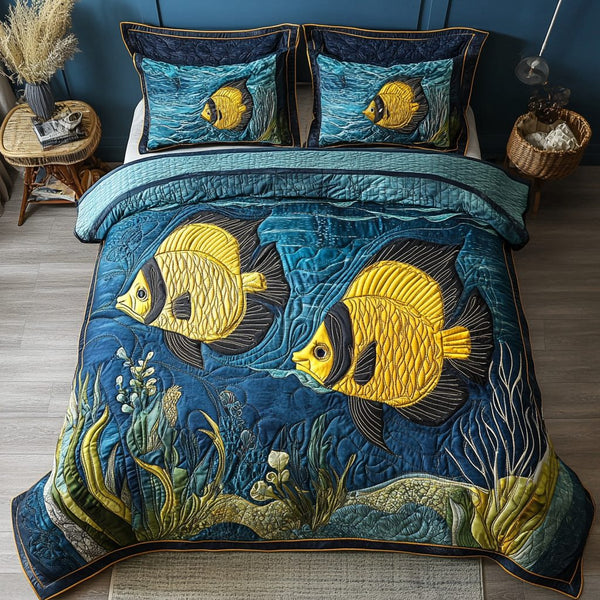 Underwater Vibes quilted 3-piece bedding set on a made bed with two matching pillow shams