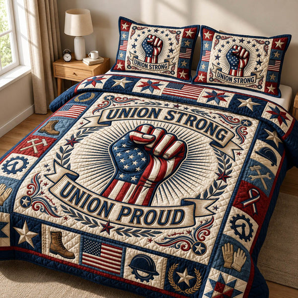 Union Strong Union Proud quilted 3-piece bedding set on a made bed in a warmly lit bedroom