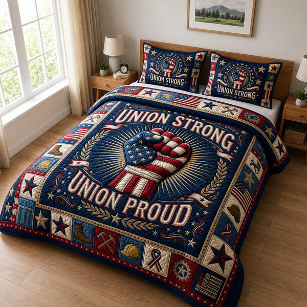 Union Strong Union Proud quilted 3-piece bedding set on a made bed in a warmly lit bedroom