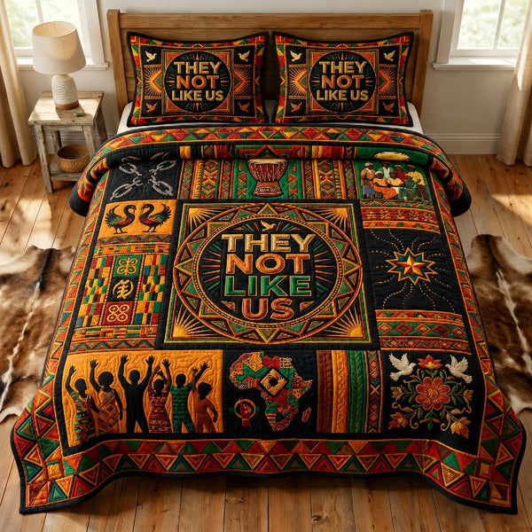 Unity Pride quilted 3-piece bedding set on a made bed with two matching pillow shams