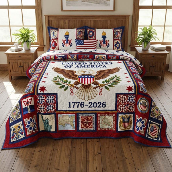 Unity Quilt quilted 3-piece bedding set on a made bed with two matching pillow shams