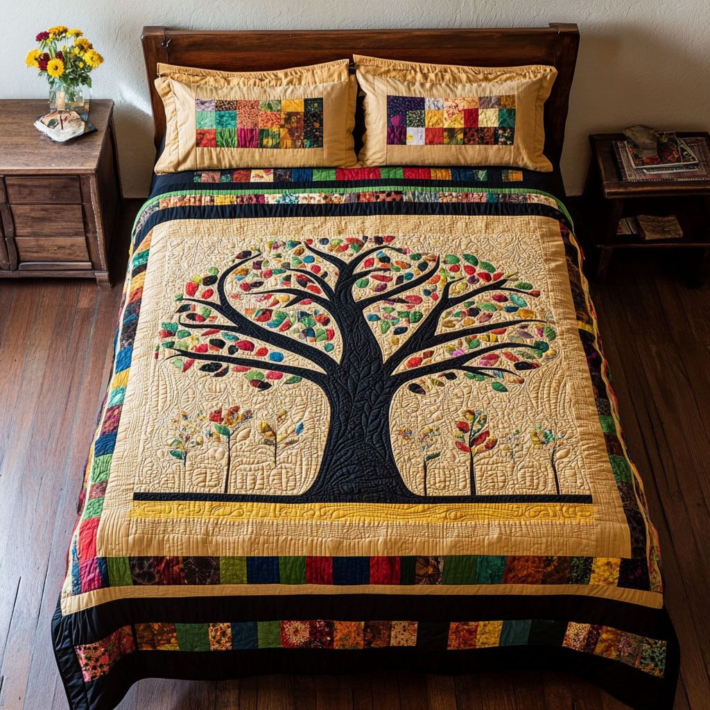 Unity Tree quilted 3-piece bedding set on a made bed with two matching pillow shams