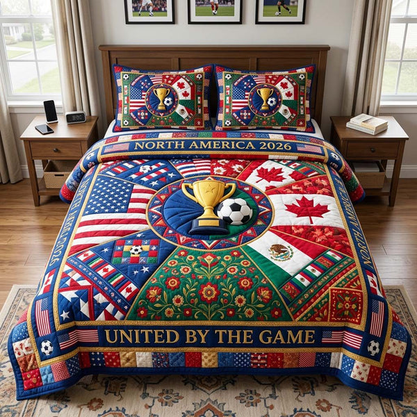 Unity Trophy quilted 3-piece bedding set on a made bed with two matching pillow shams
