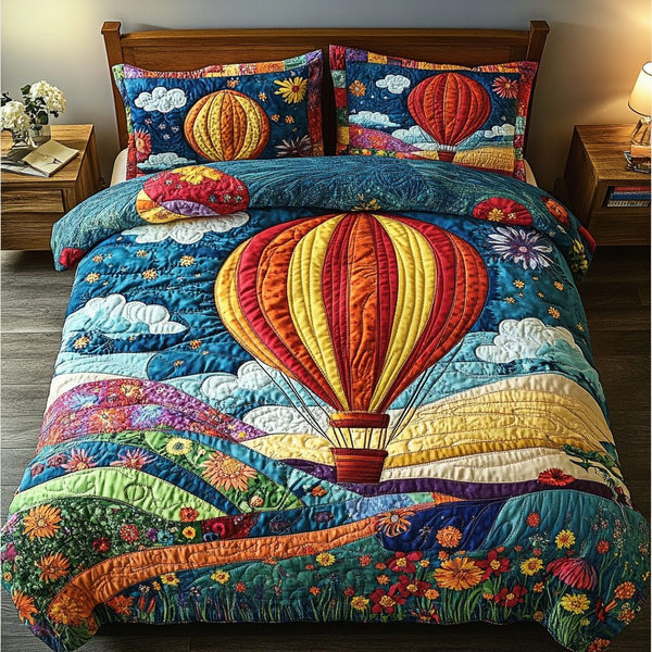 Upward Journey quilted 3-piece bedding set on a made bed with two matching pillow shams