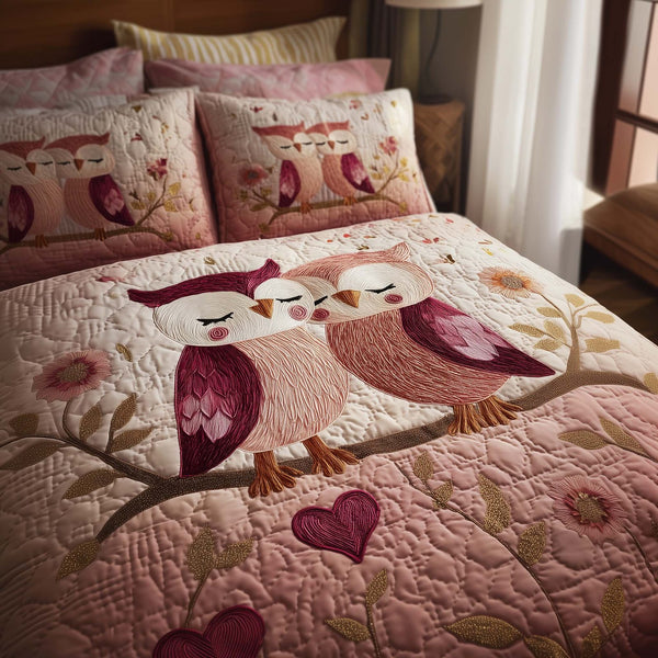Valentine Couple quilted 3-piece bedding set on a made bed with two matching pillow shams