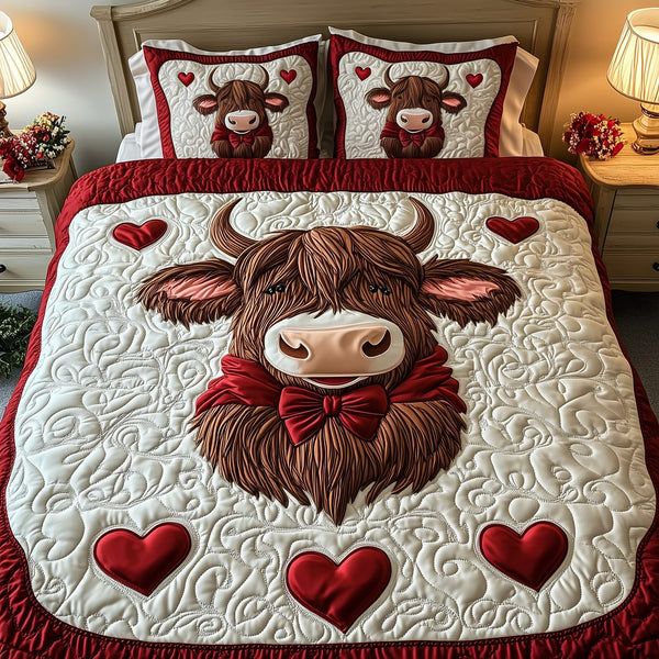 Valentine Highland Cow quilted 3-piece bedding set on a made bed with two matching pillow shams