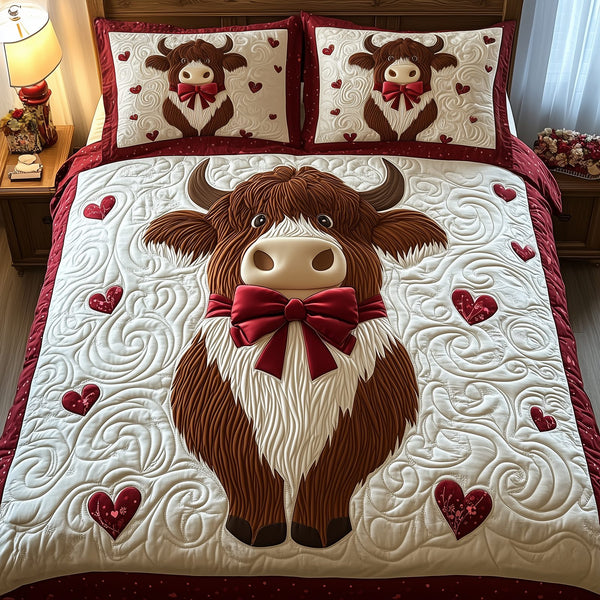 Valentine Highland Cow quilted 3-piece bedding set on a made bed with two matching pillow shams