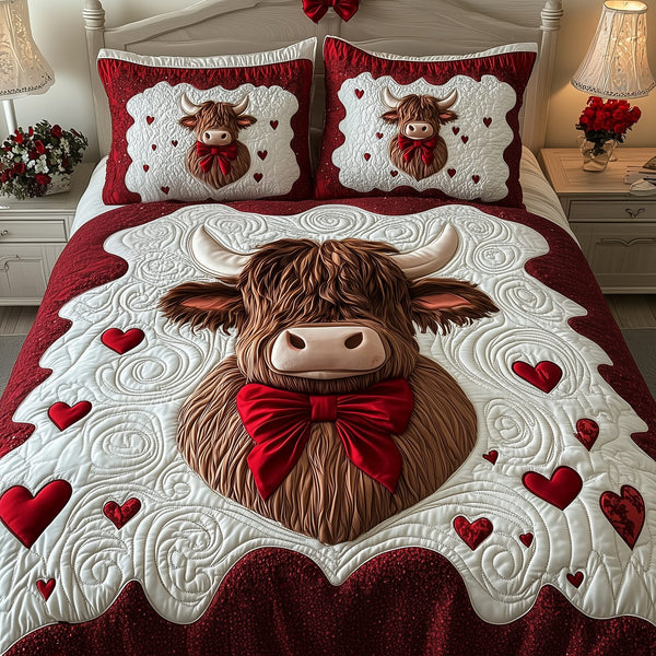 Valentine Highland Cow quilted 3-piece bedding set on a made bed with two matching pillow shams
