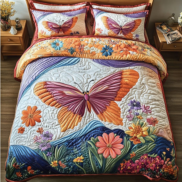 Velvet Flutter quilted 3-piece bedding set on a made bed with two matching pillow shams