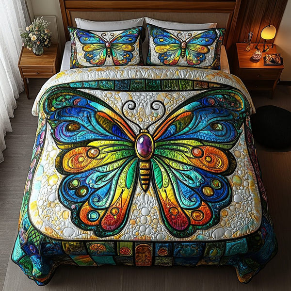 Velvet Flutter quilted 3-piece bedding set on a made bed with two matching pillow shams