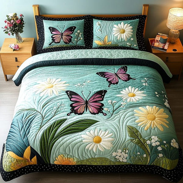 Velvet Flutter quilted 3-piece bedding set on a made bed with two matching pillow shams