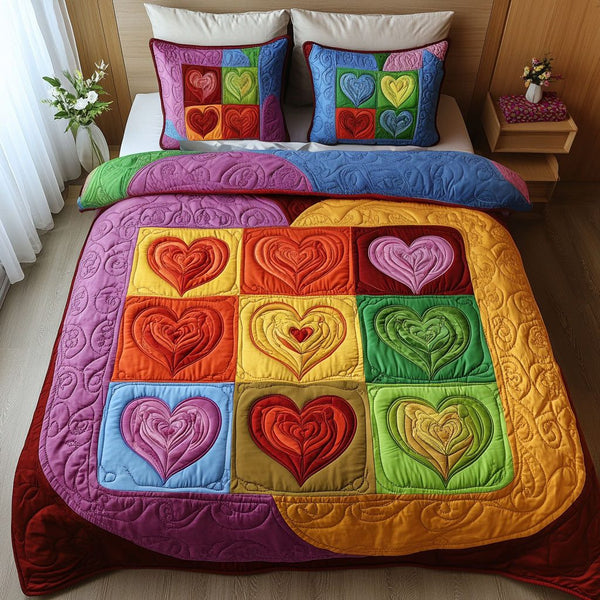 Velvet Love quilted 3-piece bedding set on a made bed with two matching pillow shams