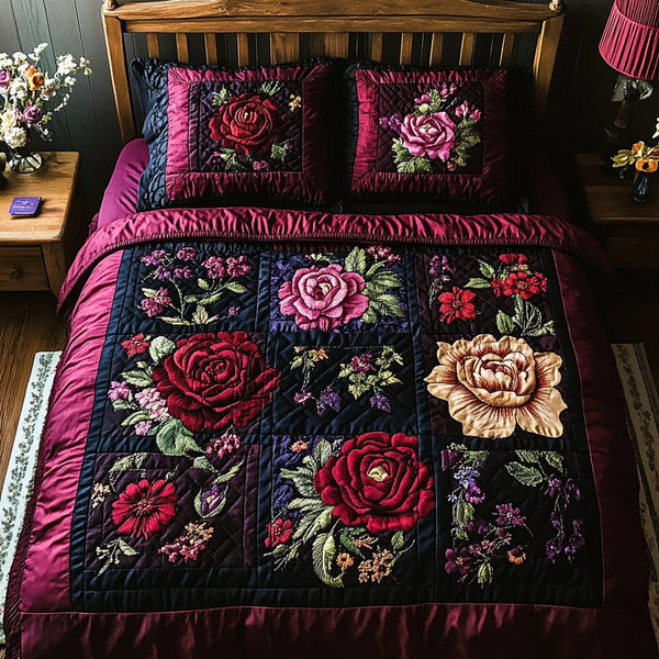Velvet Roses quilted 3-piece bedding set on a made bed with two matching pillow shams