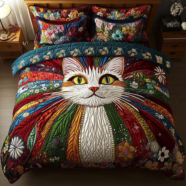 Velvet Whiskers quilted 3-piece bedding set on a made bed with two matching pillow shams